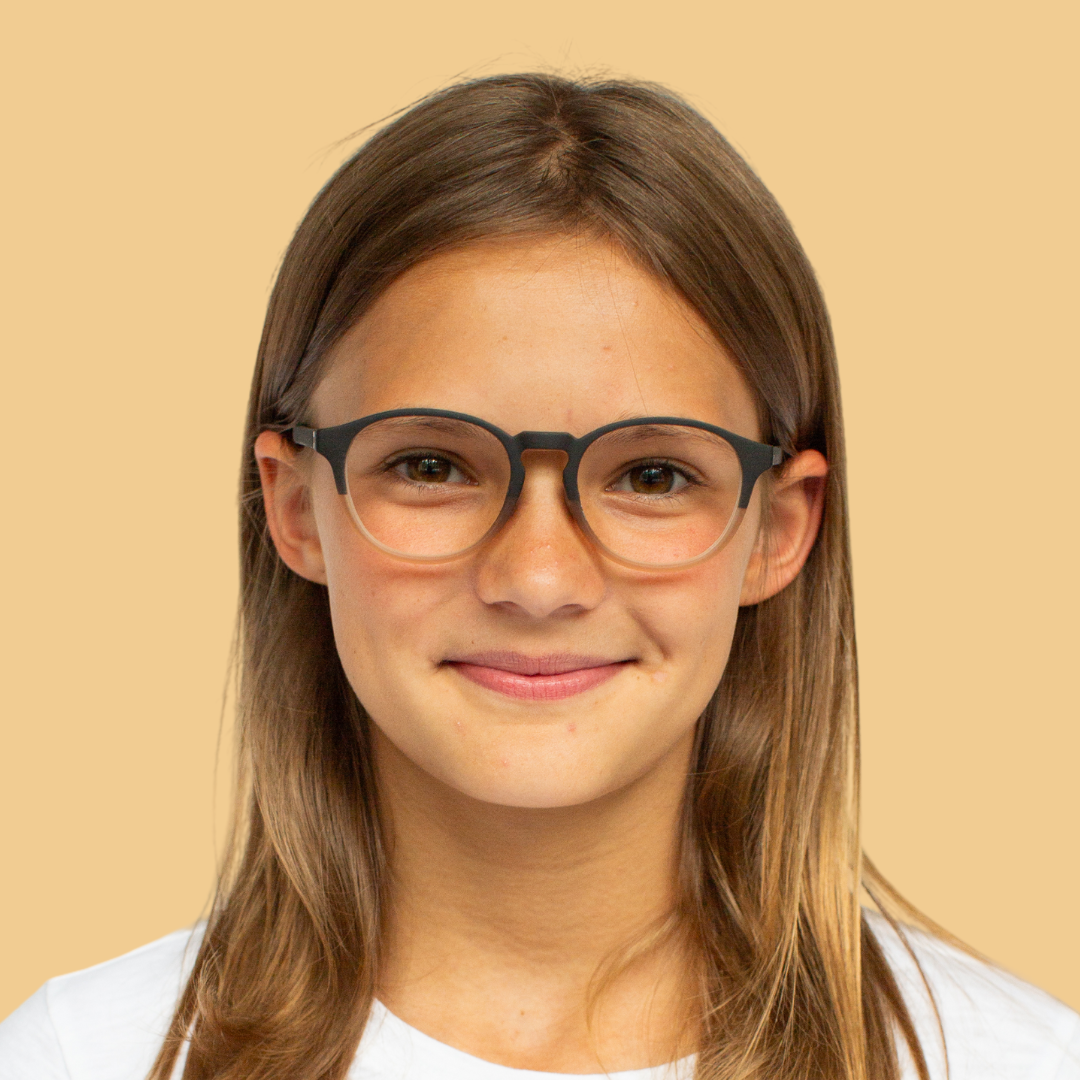 Girl wearing Small (44-16-125) / Matte Chocolate Fade round glasses 