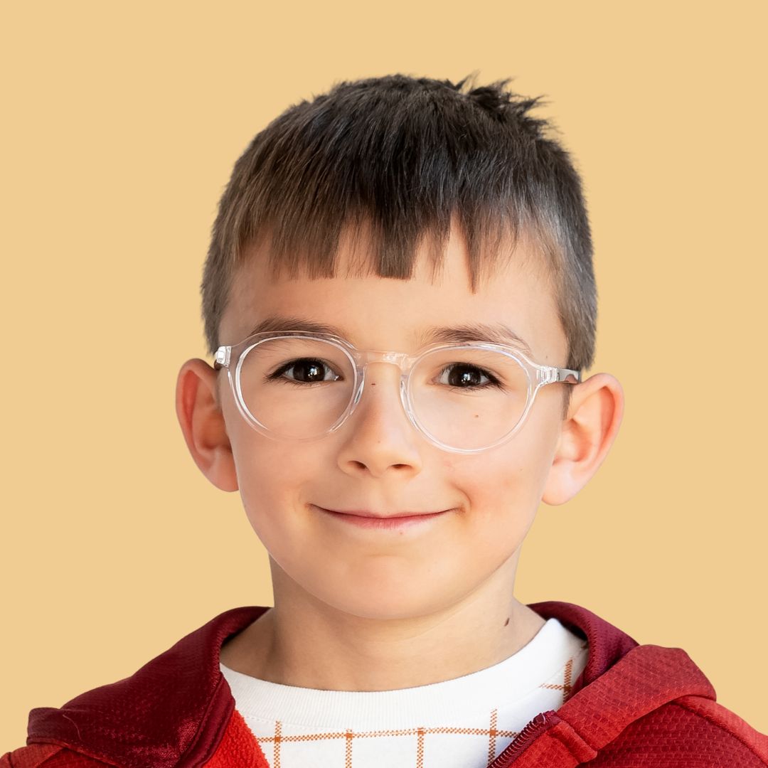 Boy wearing Small (45-19-125) / Clear Hazelnut Round glasses 