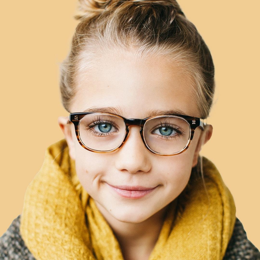 Girl wearing Small (44-15-125) / Striped Maple round glasses 