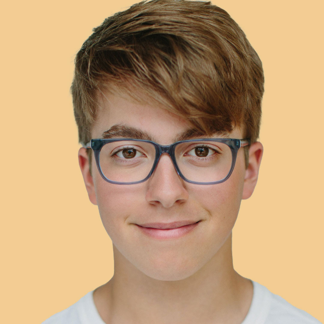 Boy wearing Large (51-15-140) / Indigo Crystal rectangle glasses 