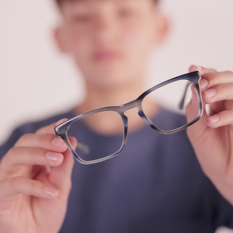 Boy wearing Large (50-17-135) / Striped Atlantic rectangle glasses [color=Striped Atlantic] [ugc=Size Large (Age 13-17)] [child face]