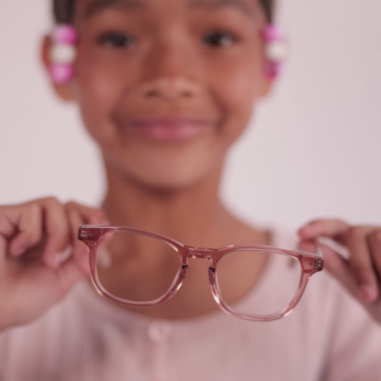 Girl wearing Medium (46-17-130) / Rose Gold Crystal square glasses [color=Rose Gold Crystal] [size=Medium (46-17-130)] [child face]