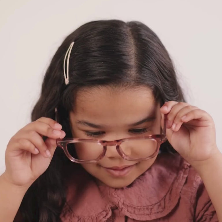 Girl wearing Small (44-17-125) / Rose Gold Crystal square glasses [color=Rose Gold Crystal] [size=Small (44-17-125)][child face]