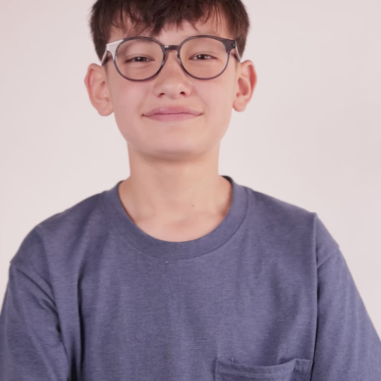 Boy wearing Large (49-16-140) / Blue Crush round glasses [ugc=Size Large (Age 8-12)] [color=blue crush] [child face]
