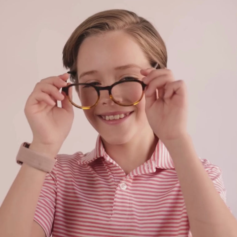 Boy wearing Medium (48-19-130) / Hazelnut Fade Round glasses [color=Hazelnut Fade] [size=Medium (48-19-130)][child face]