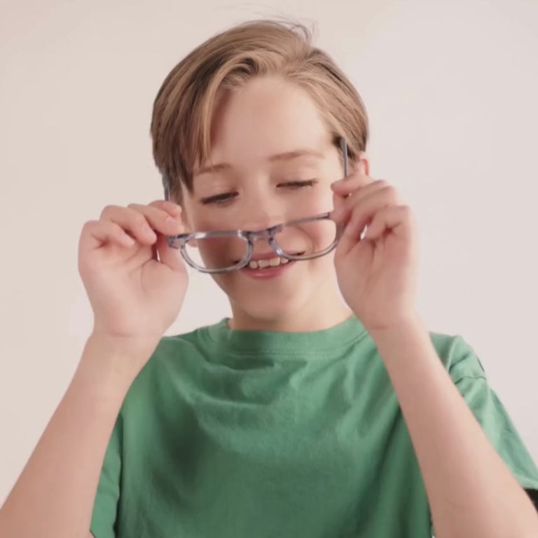 Boy wearing Medium (46-17-130) / Glacier Crystal square glasses [color=Glacier Crystal] [size=Medium (46-17-130)][child face]