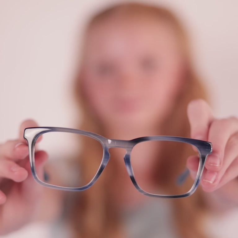 Girl wearing Large (50-17-135) / Striped Atlantic rectangle glasses [color=Striped Atlantic] [ugc=Size Large (Age 13-17)] [child face]