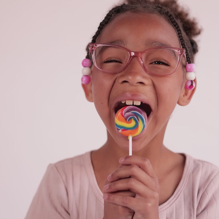 Girl wearing Medium (48-16-135) / Cherry Blossom Cat Eye glasses [ugc=Size Medium (Age 8-12)] [color=Cherry Blossom] [child face]