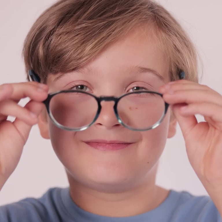 Boy wearing Medium (46-17-130) / Blue Crush Fade round glasses [color=Blue Crush Fade] [ugc=Size Medium (Age 8-12)] [child face]