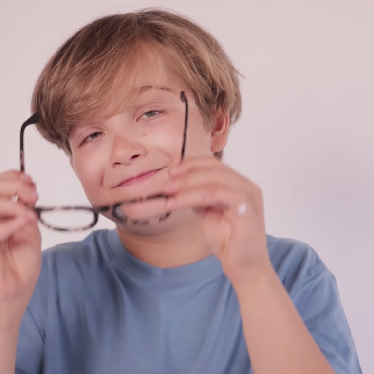Boy wearing Medium (46-17-130) / Crystal Tortoise square glasses [color=Crystal Tortoise] [ugc=Size Medium (Age 8-12)] [child face]