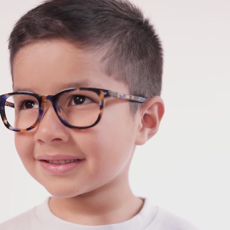 Boy wearing Small (44-17-125) / Lemon Blueberry Tortoise round glasses [color=Lemon Blueberry Tortoise] [ugc=Size Small (Age 4-7)] [child face]
