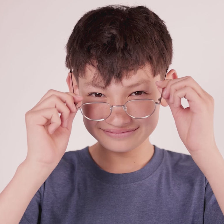 Boy wearing Medium (47-20-140) / Silver round glasses [color=Matte Silver] [ugc=Size Medium (Age 13-17)] [child face]