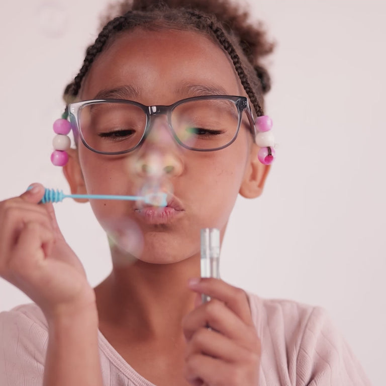 Girl wearing Medium (48-16-130) / Indigo Crystal rectangle glasses [color=Indigo Crystal] [ugc=Size Medium (Age 8-12)] [child face]