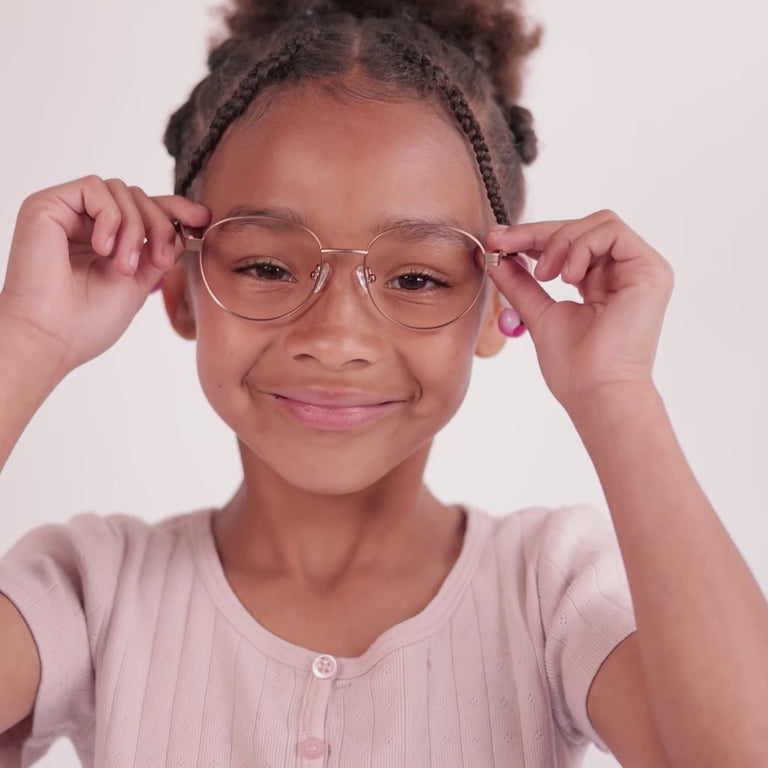 Girl wearing Medium (49-17-135) / Rose Gold round glasses [color=Rose Gold] [ugc=Size Medium (Age 8-12)] [child face]