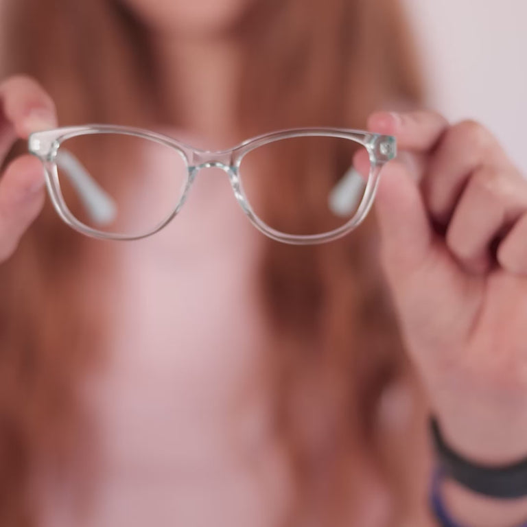 Girl wearing Medium (47-16-130) / Sea Glass cat eye glasses [variants=40028183822421, 40028183298133] [color=Sea Glass] [size=Medium (47-16-130), Small (44-16-125)][child face]