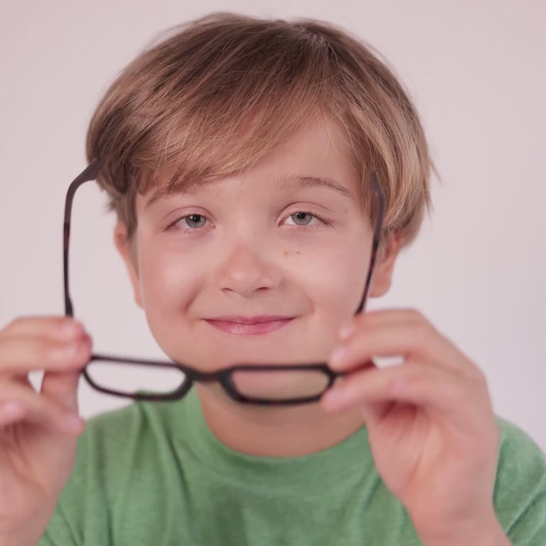 Boy wearing Medium (48-16-135) / Matte Maple Tortoise rectangle glasses [color=Matte Maple Tortoise] [ugc=Size Medium (Age 8-12)] [child face]