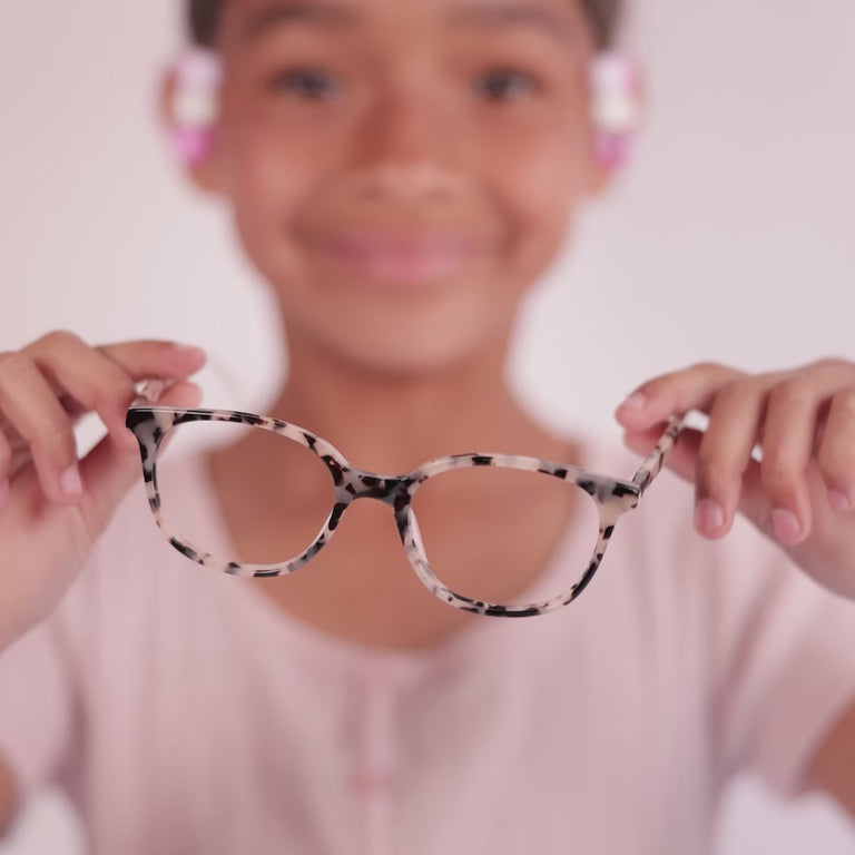 Girl wearing Medium (48-17-135) / Cream Tortoise round glasses [color=Cream Tortoise] [ugc=Size Medium (Age 8-12)] [child face]