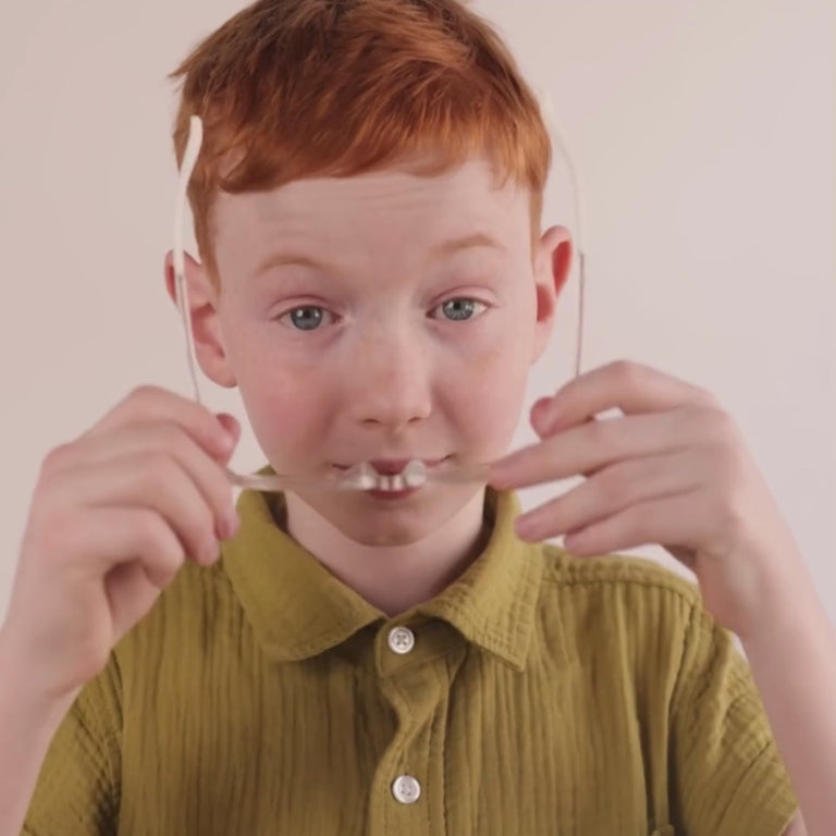 Boy wearing clear rectangle glasses  [color=Clear] [size=Medium (48-15-130)] [child face]