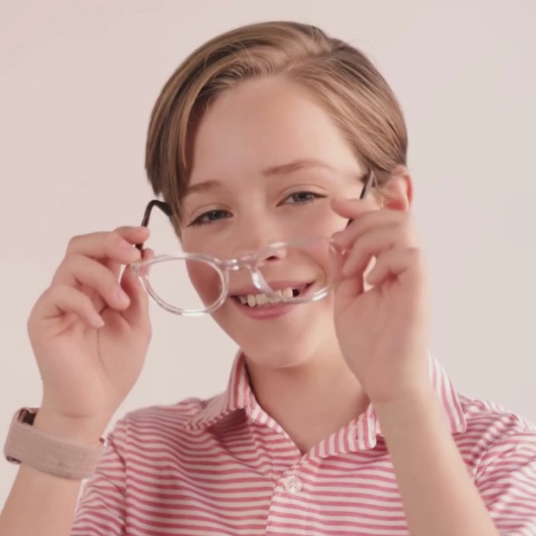 Boy wearing Medium (48-19-130) / Clear Hazelnut Round glasses  [color=Clear Hazelnut] [size=Medium (48-19-130)][child face]
