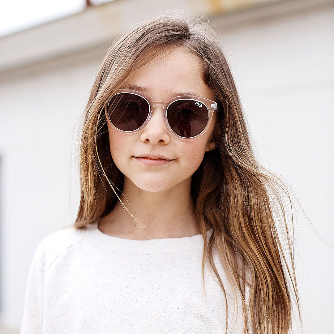 Girl wearing Large (52-20-140) / Grapefruit round sunglasses 